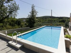 Apartments Villa Harmonia - One-Bedroom Apartment with Patio and Shared Pool - Cilipi - image1