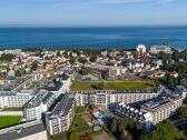 Aerial view of the facility and the sea