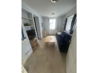 Wohnzimmer - Doppelbettcoch - 32" TV