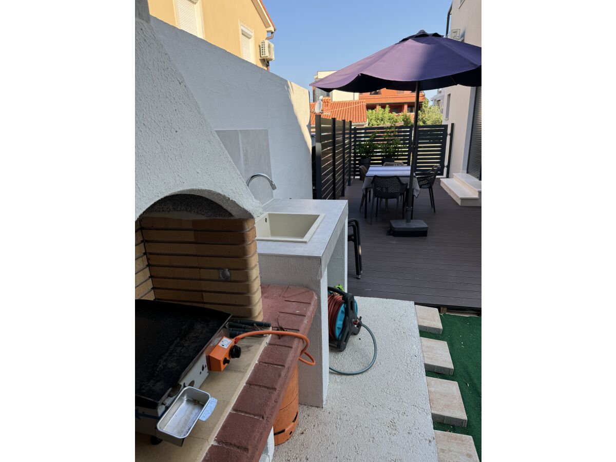 Grill und Terrasse des Apartment