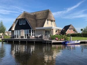 Holiday park Beautiful villa with sauna on the Tjeukemeer - Delfstrahuizen - image1