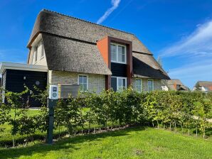 Holiday park Beautiful villa with sauna and view - Delfstrahuizen - image1