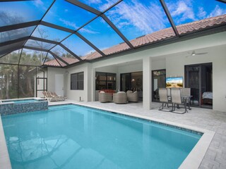 Swimming pool with hot tub