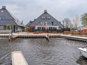 Geräumiges Ferienhaus mit Hafenblick - Uitwellingerga - image1