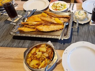 Sandscholle essen in England
