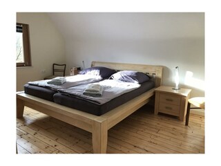 Schlafzimmer 1 mit Blick zum Fluß Urft (Südseite)