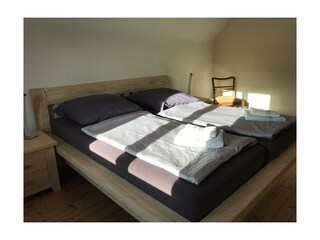 Schlafzimmer 1 mit Blick  zum Fluß Urft (Südseite)