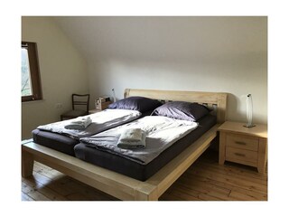 Schlafzimmer 1 mit Blick zum Fluß Urft (Südseite)