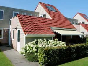 Holiday park Well-kept holiday home with roof terrace - Kortgene - image1