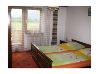 Zimmer mit Balkon