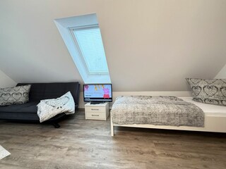 Einzelbett im OG