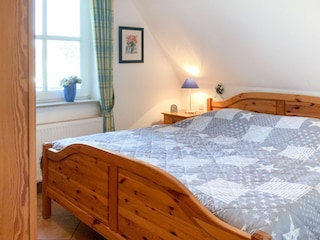 Schlafzimmer mit Doppelbett