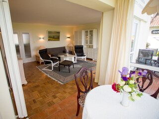 Living room, dining table and sofa