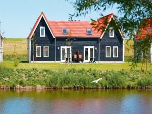 Holiday park Restyled villa with four bathrooms near the Grevelingen Lake - Bruinisse - image1