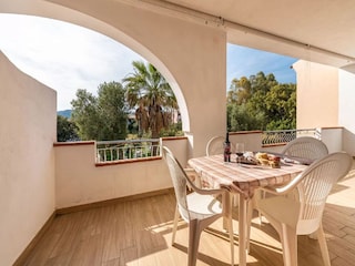 Appartement Cala Liberotto Buitenaudio-opname 4