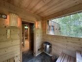 Wonderful sauna with a view of the forest.