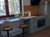 Die Küche mit Bartheke