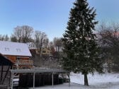 Carport hinter dem Haus