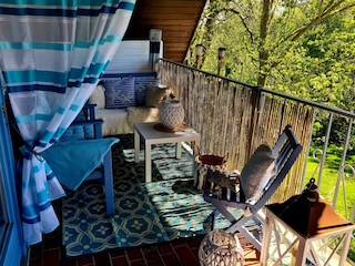 Balkon unterm Reetdach