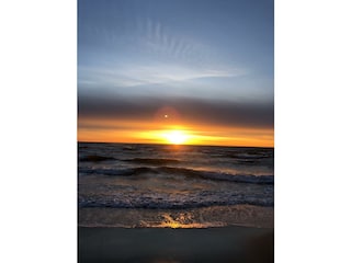 Sonnenaufgang in Damp am Strand