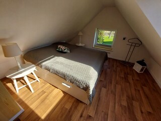Schlafzimmer im 1. Stock der Wohnung