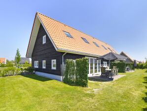 Parc de vacances Maison spacieuse avec sauna, à 700 m de la plage - Nieuwvliet - image1