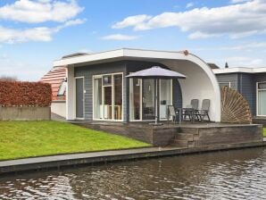 Bungalow aan het water op een vakantiepark - De Groeve - image1