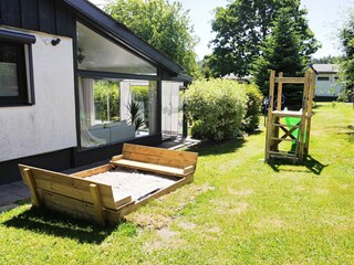 Spielbereich mit Sandkiste