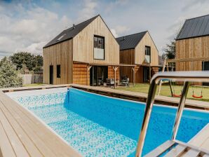 Maison de vacances Complexe de vacances avec piscine à Nadole - Lubiatovo - image1