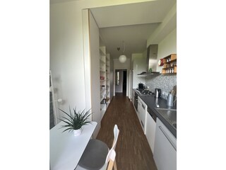 Essküche mit Zugang zum Balkon/Gartenseite