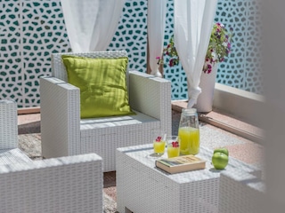 Villa Micol – Poolside seating area