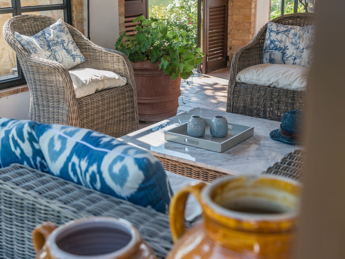 Casa Felice - Veranda mit Korbsesseln