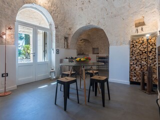 Trulli dei Gelsomini - Wohnzimmer mit Küchenzeile