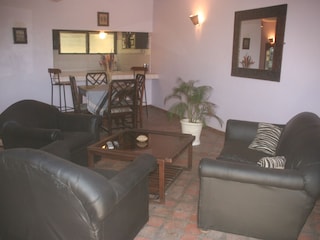 Lounge and dining with kitchen and breakfast bar