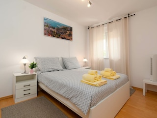 Bedroom with queen bed