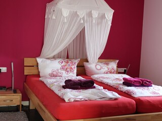 Schlafzimmer in Orchidee