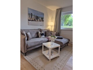 Souterrain-Wohnung mit Gartenblick