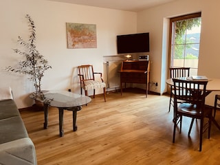 Wohnzimmer mit Wohnküche