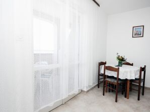 Two bedroom apartment with terrace and sea view Barbat, Rab (A-5070-a) - Banjol - image1