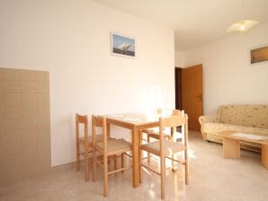 Two bedroom apartment with balcony and sea view Seget Vranjica, Trogir (A-8507-a) - Seget Vranjica - image1