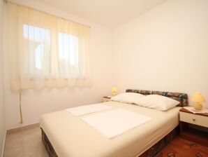 Two bedroom apartment with balcony and sea view Seget Vranjica, Trogir (A-8507-a) - Seget Vranjica - image1