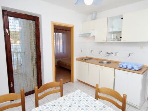 Two bedroom apartment near beach Vinišće, Trogir (A-5982-a) - Vinisce - image1