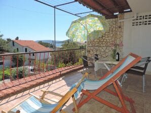 Two bedroom apartment with terrace and sea view Seget Vranjica, Trogir (A-975-a) - Seget Vranjica - image1