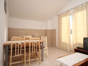 Two bedroom apartment with balcony and sea view Seget Vranjica, Trogir (A-8507-c) - Seget Vranjica - image1