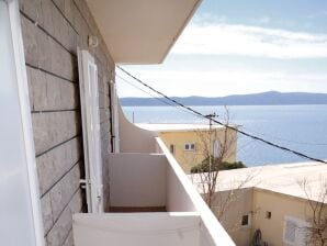 Three bedroom apartment with terrace and sea view Drašnice, Makarska (A-5265-b) - Drasnice - image1