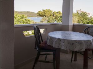 One bedroom apartment with terrace and sea view Cove Mala Lamjana, Ugljan (A-8449-b) - Kali - image1