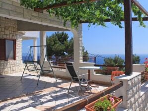 Two bedroom apartment with terrace and sea view Sveta Nedilja, Hvar (A-8792-a) - Ivan Dolac - image1