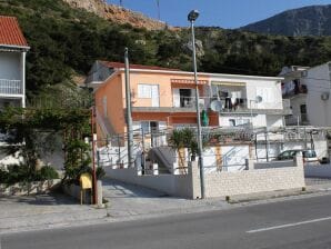 One bedroom apartment near beach Duće, Omiš (A-5275-c) - Dugi Rat - image1