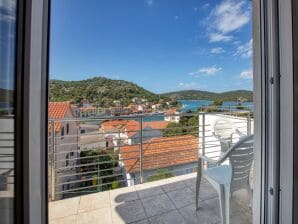 One bedroom apartment with balcony and sea view Tisno, Murter (A-4295-d) - Tisno - image1