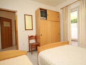 One bedroom apartment near beach Duće, Omiš (A-5275-b) - Dugi Rat - image1